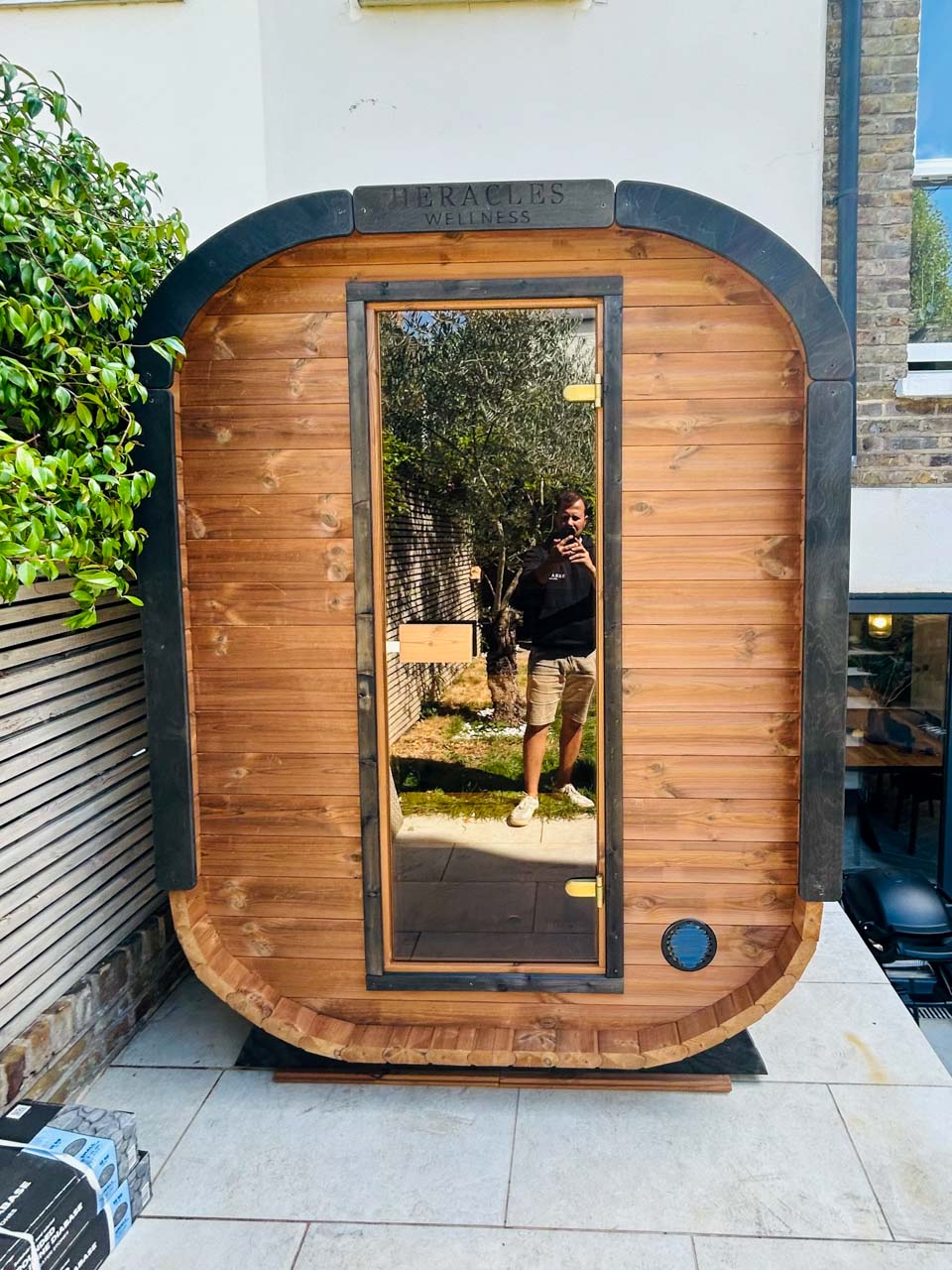 Camilla Compact ThermoWood sauna exterior and glass door
