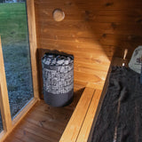 Leil Aris Mini outdoor sauna lifestyle image showing modern garden placement