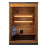 Leil Aris Mini compact outdoor sauna side angle showing ThermoWood cladding