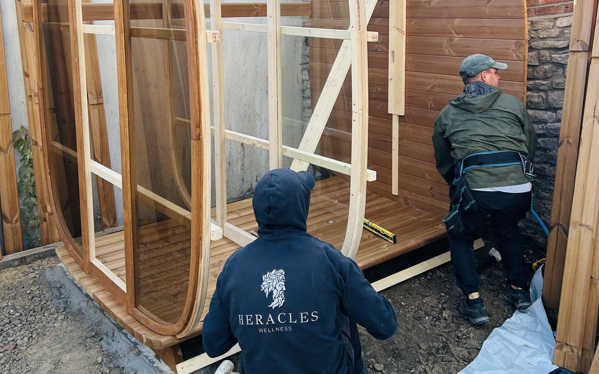 Heracles Wellness installation team building a Leil sauna